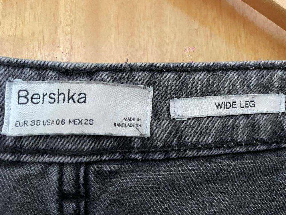 Calças cinzentas rasgadas Bershka