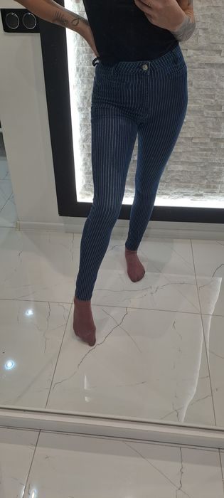 Spodnie w paski roz S