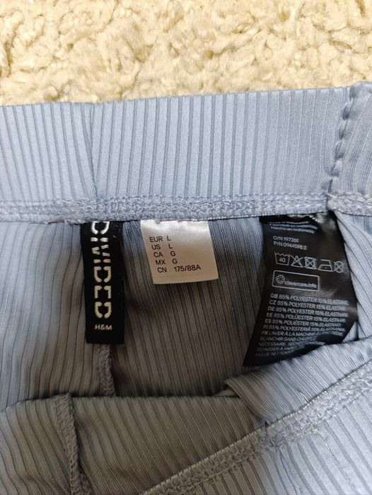 Штани клеш в рубчик