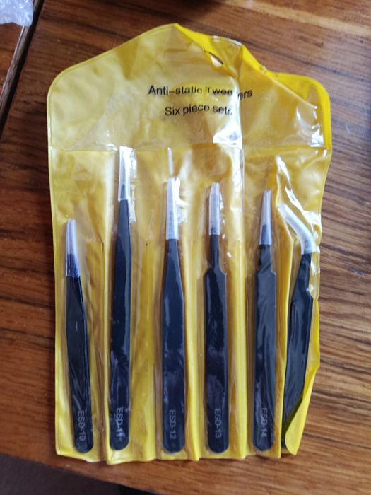 Пінцети нові металеві