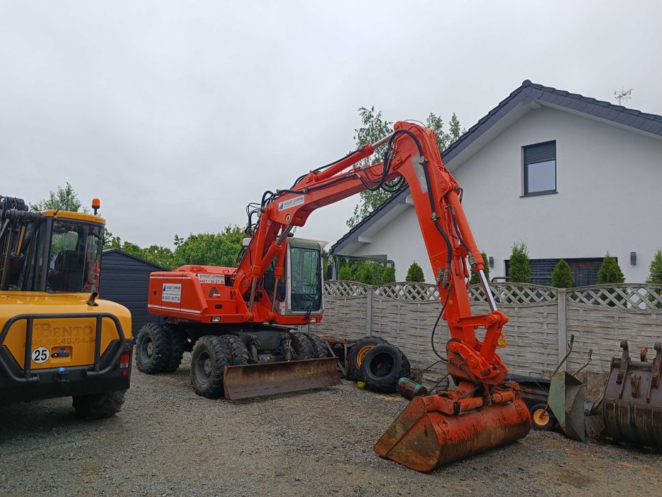 usługi koparka Mecalac koparka kołowa