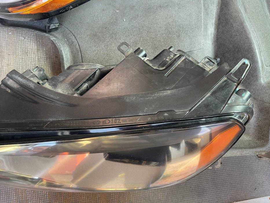 левая фара volkswagen touareg NF