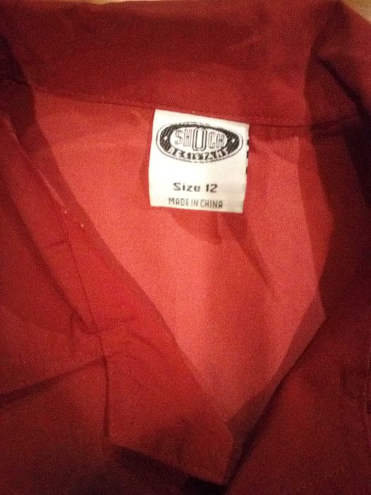 Camisa tribal verde e vermelho