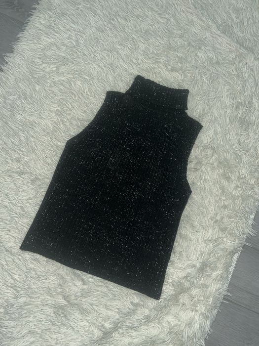 кофточка без рукавів