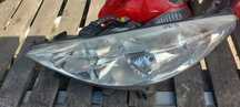 .  PRZOD PRZEDNIA LAMPA LEWA PEUGEOT 207 !ŚREDNI STAN!