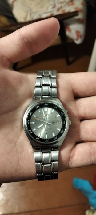 Orient автоматичний годинник 

Цін