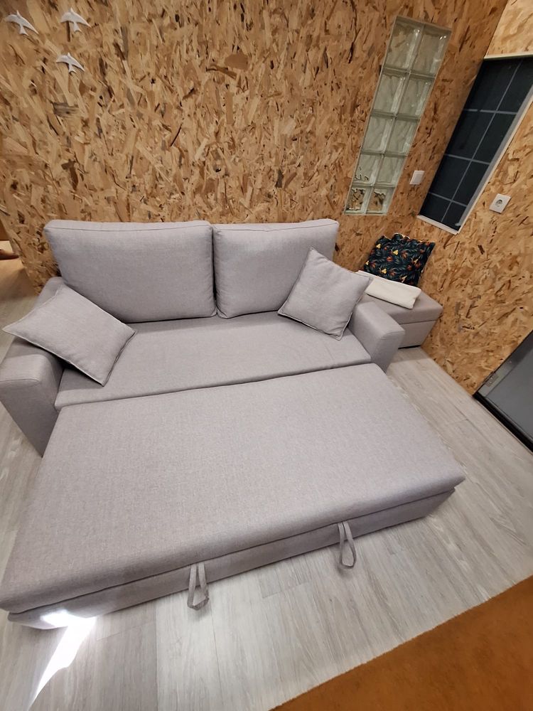 Sofá-cama em tons cinza