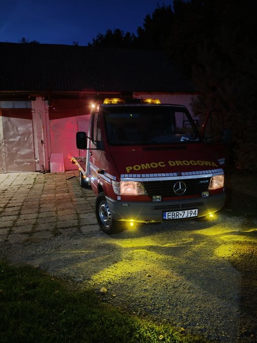 24 h/7  LAWETA  Pomoc drogowa, holowanie.PARKING POWYPADKOWY.