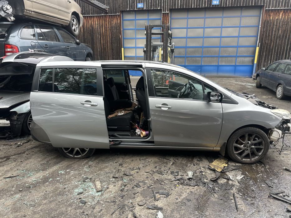 Розборка мазда 5 двери мотор mzr 2.0 disi капот кляпа бампер шрот