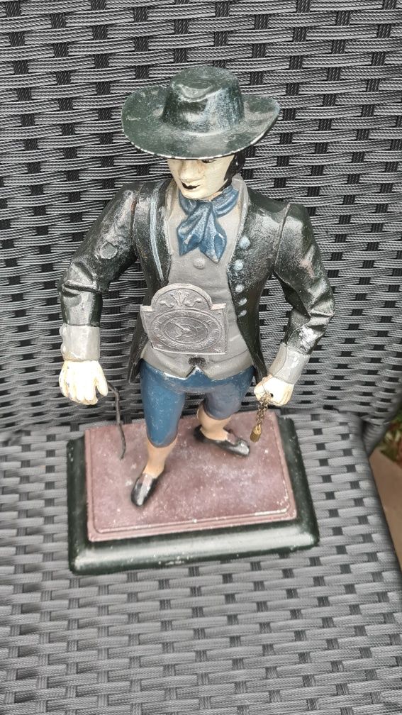 Zegar figuralny, figura sprzedawca zegarów