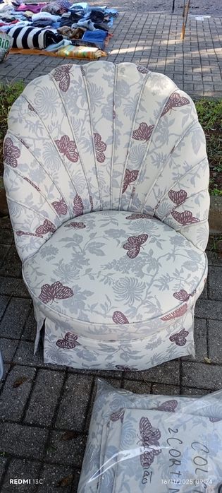 Cadeirão com colcha e cotinados