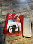 Nintendo Switch Oled ,komplet z grami,dodatkowym padem i Etui