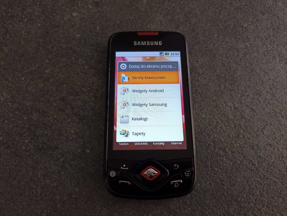 Telefon komórkowy - SAMSUNG GT-I5700 - stan idealny + etui ochronne