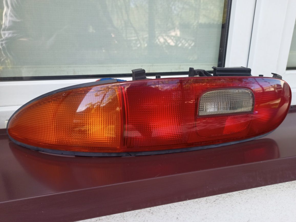 Mazda MX3 lampa tył tylna lewa oprawki