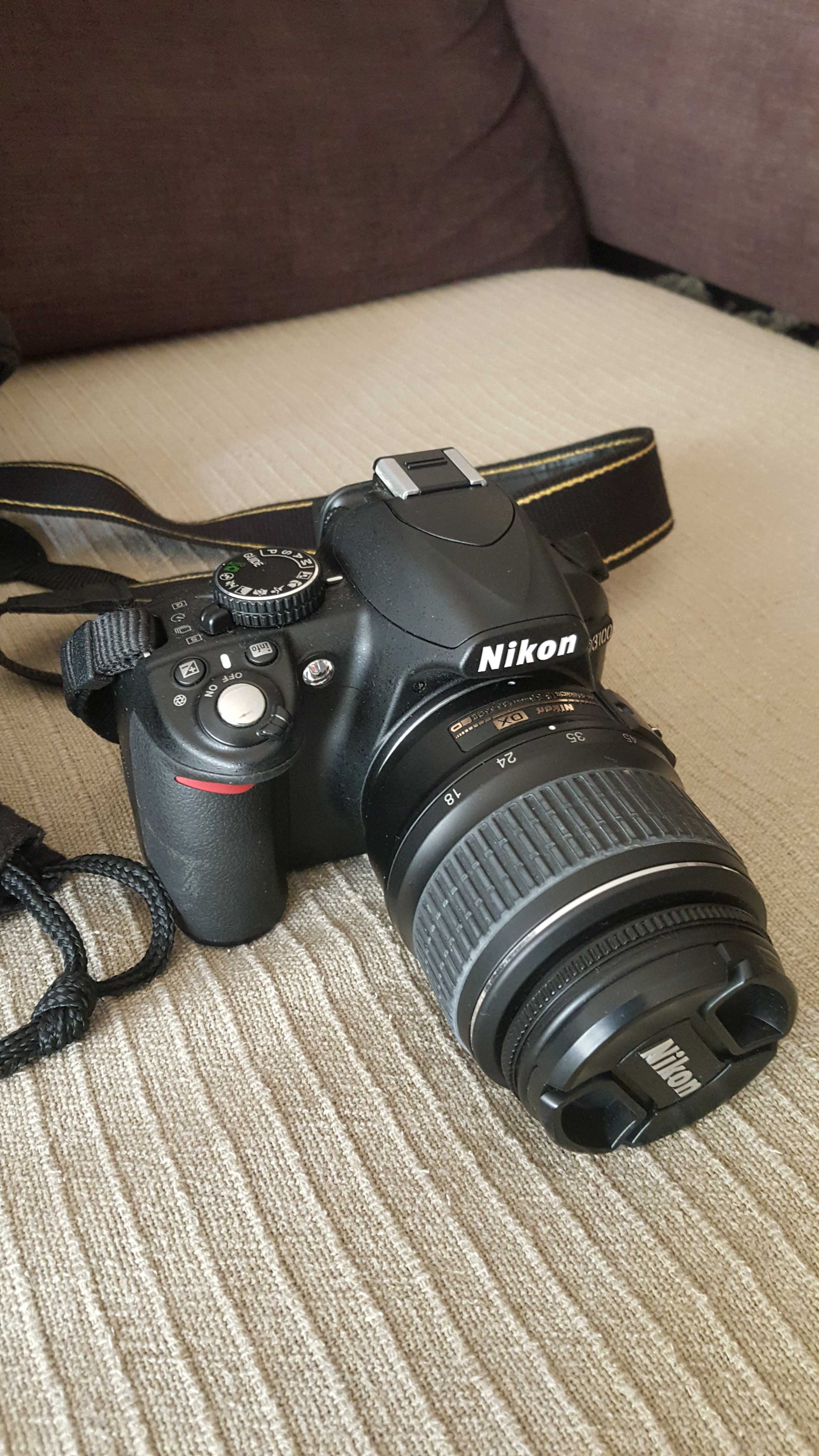 Nikon D3100+objetivas(18-55/ 55-200) + adaptador+mochila
