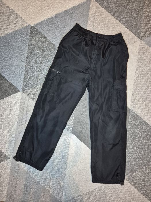 Ocieplane spodnie dziecięce rozmiar 146 cm