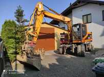 Caterpillar M312 Koparko-Ładowarka