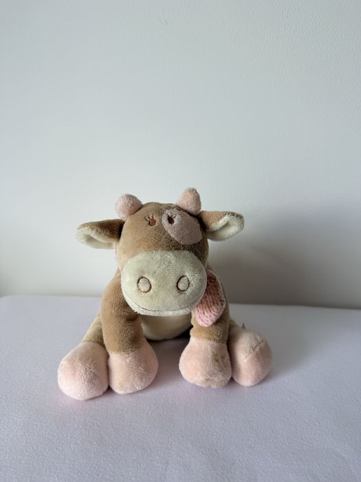 Vaquinha musical de pelúcia