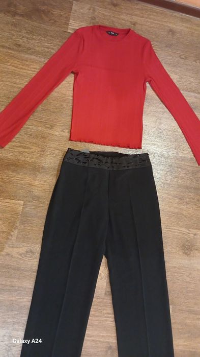 Штани -палацо чорні та в клітинку