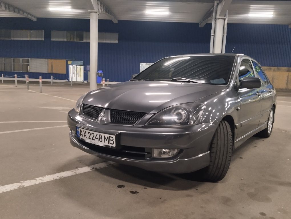 Митсубиси Лансер 9 2л .
