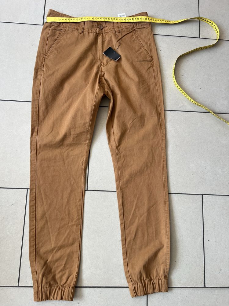Spodnie meskie Cropp 28 S kolor rudy