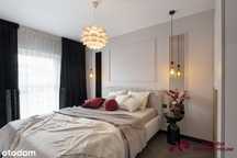 Elegancki apartament z komórką i m. postojowym