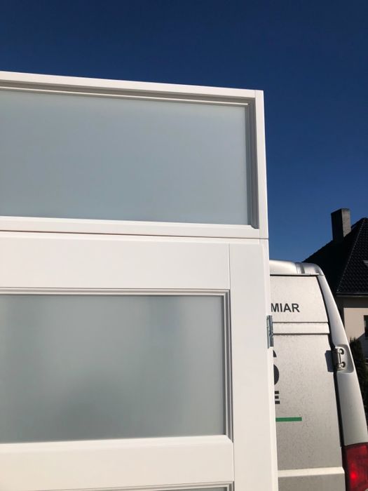 Drzwi wewnętrzne  drewniane dwuskrzydłowe z naświetlem Cała Polska