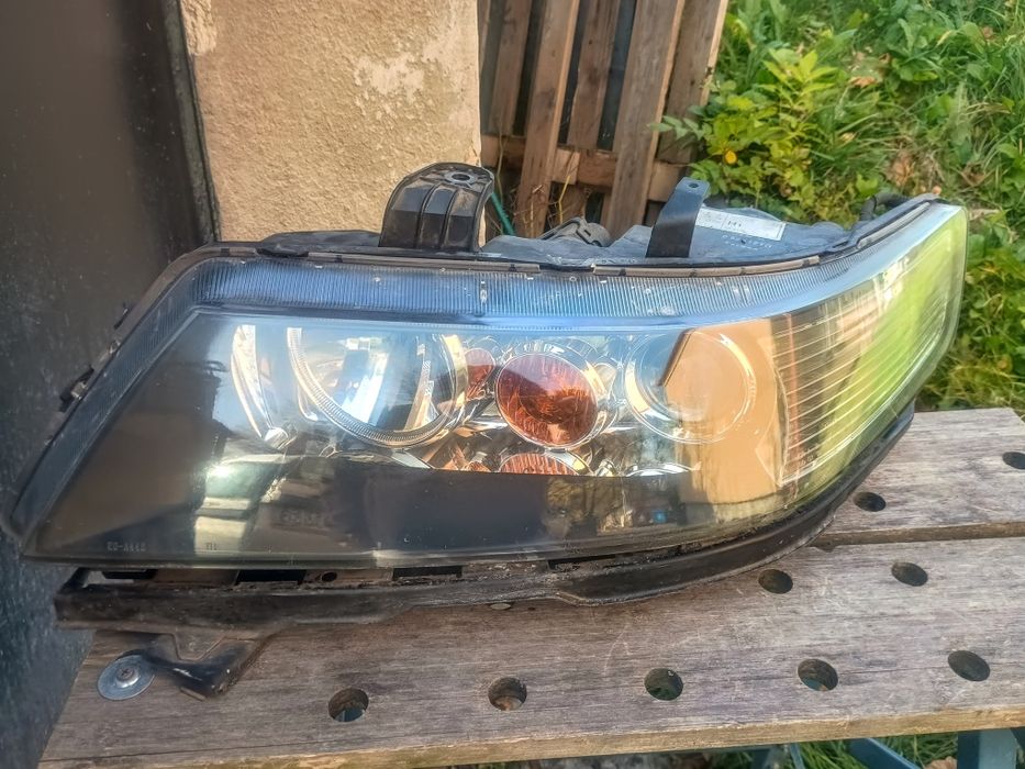 Honda Accord VII lampa przednia lewa TYC
