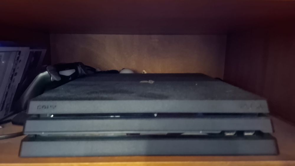 Ps4 com comando semi nova