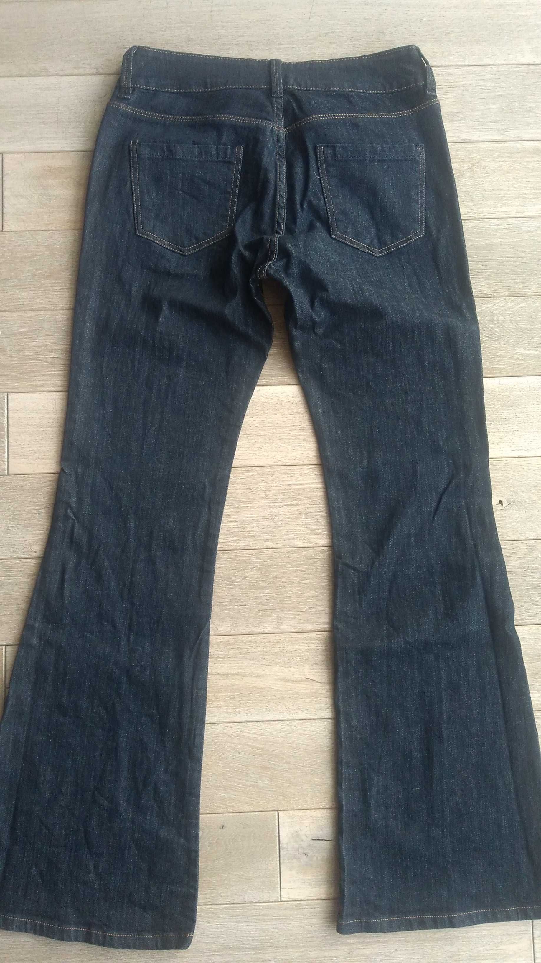 Ciemnogranatowe ładne jeansowe  spodnie jeansy dżinsy Next Flare 40