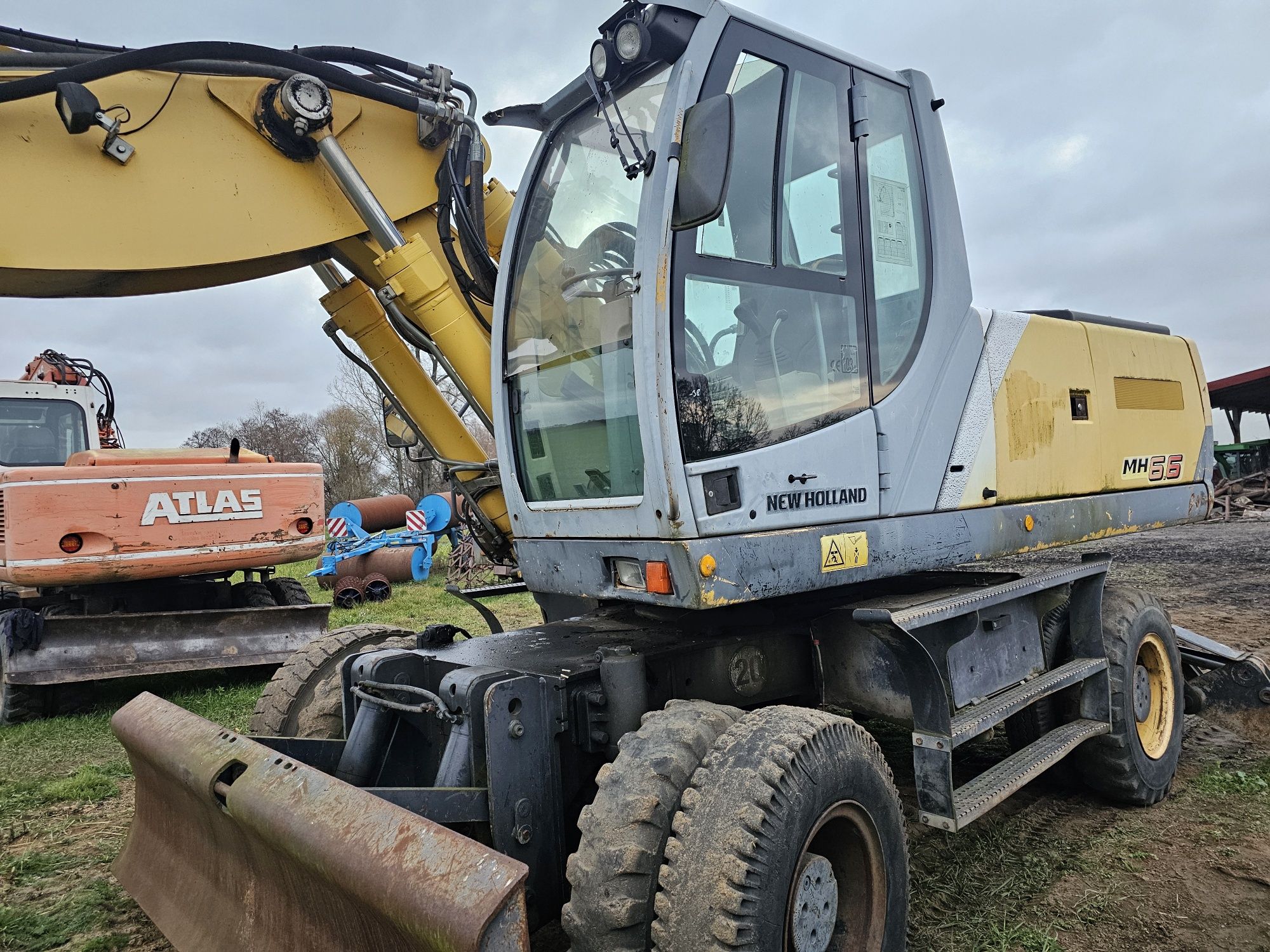Koparka kołowa New Holland MH 6.6 2006r. Atlas JCB Liebher