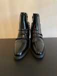 Botas pretas envernizadas