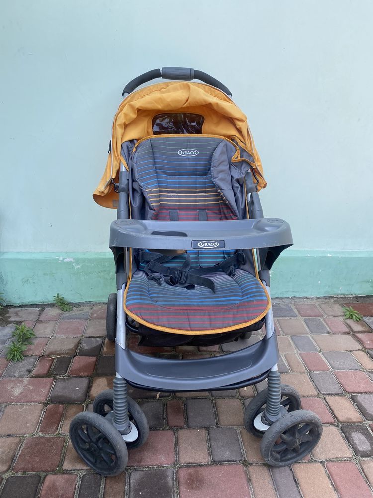 Продам Прогулочную  коляску  Graco Mirage Plus Jaffa Stripe, оранжевый