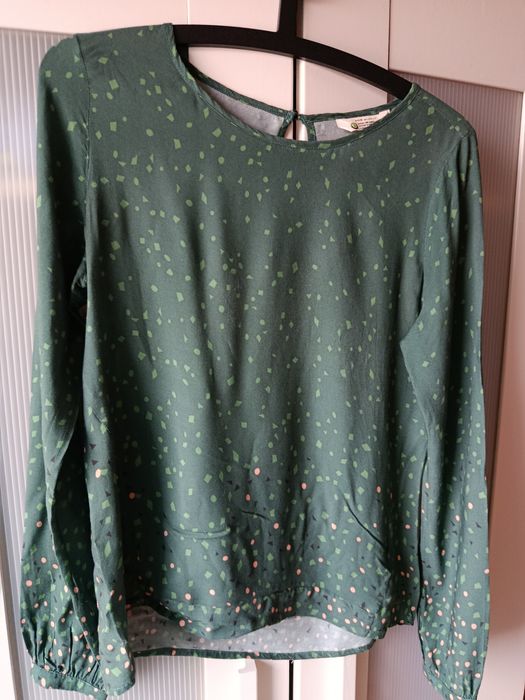 Blusa Skuklunt em bom estado