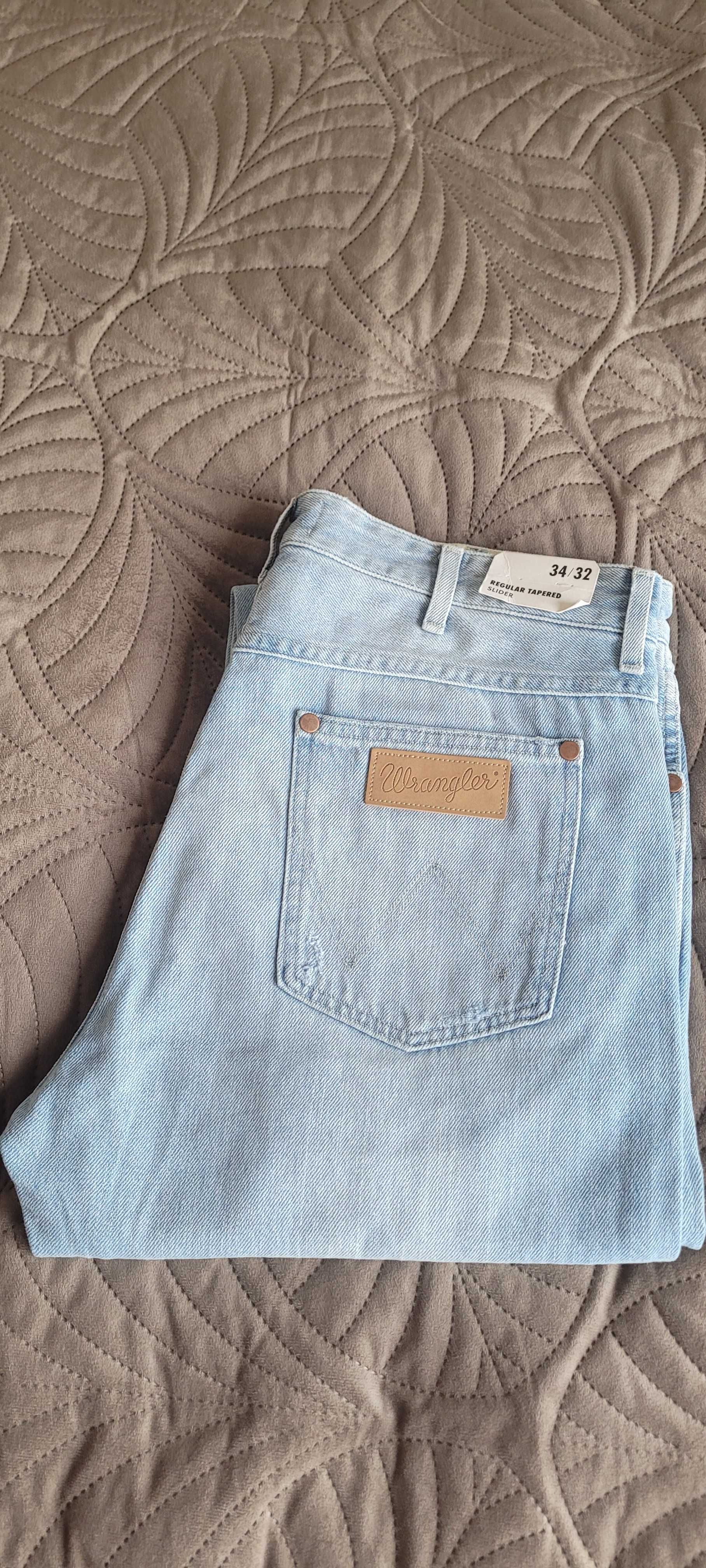 34-32 Wrangler Slider nowe z metka jeans denim spodnie jasne tapered