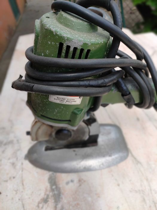Máquina de cortar tecidos Suprema.