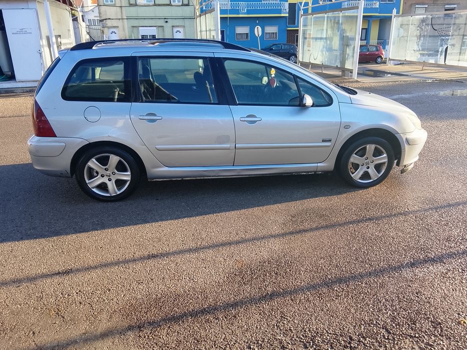 Vendo ou troco Peugeot 7 lugares 04