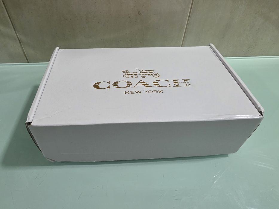 Mala e carteira Coach