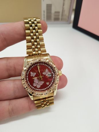 Zegarek damski Rolex Datejust złoty czerwona tarcz motylek