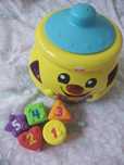 Fisher Price garnuszek na klocuszek