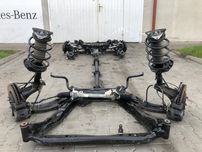 Ричаг подрамник цапфа стойка амортизатор балка Nissan Rogue X-Trail