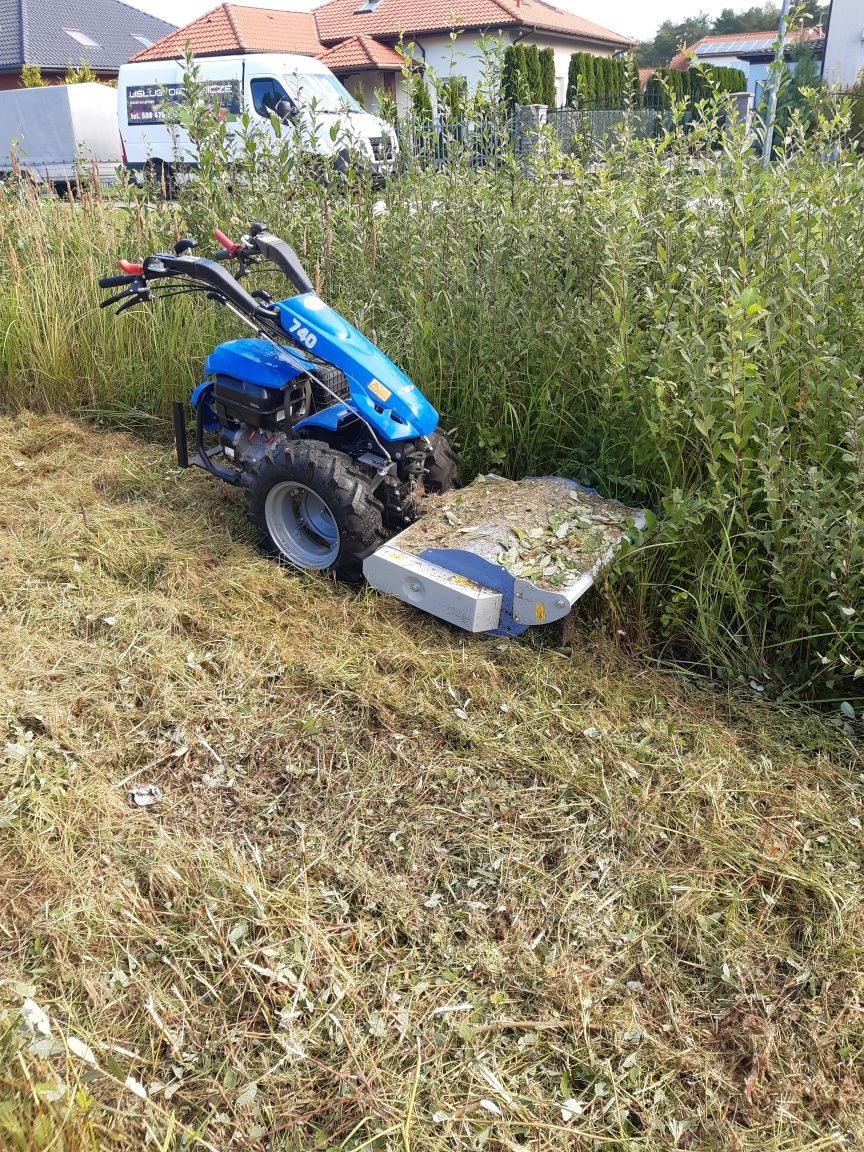 Odsniezanie traktorem z turem rownanie koszenie trawników glebogryzark
