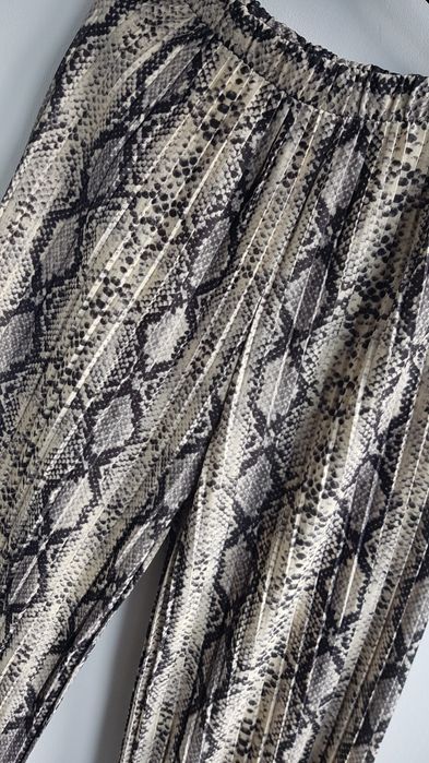 Spodnie wężowe dzwony H&M szerokie nogawki