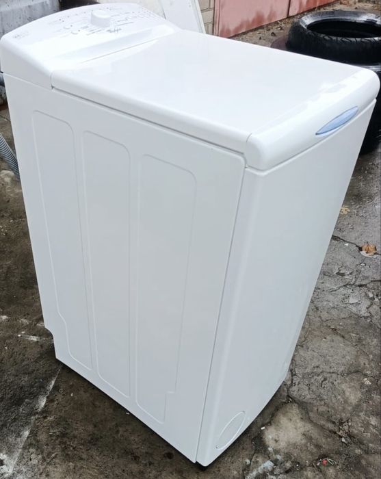 Пральна машина Whirlpool верхня загрузка