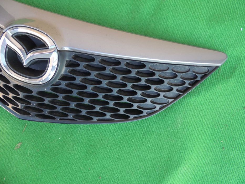 Atrapa grill wlot powietrza emblemat Mazda 3 BK 03,04,05,06-09 HB 29Y