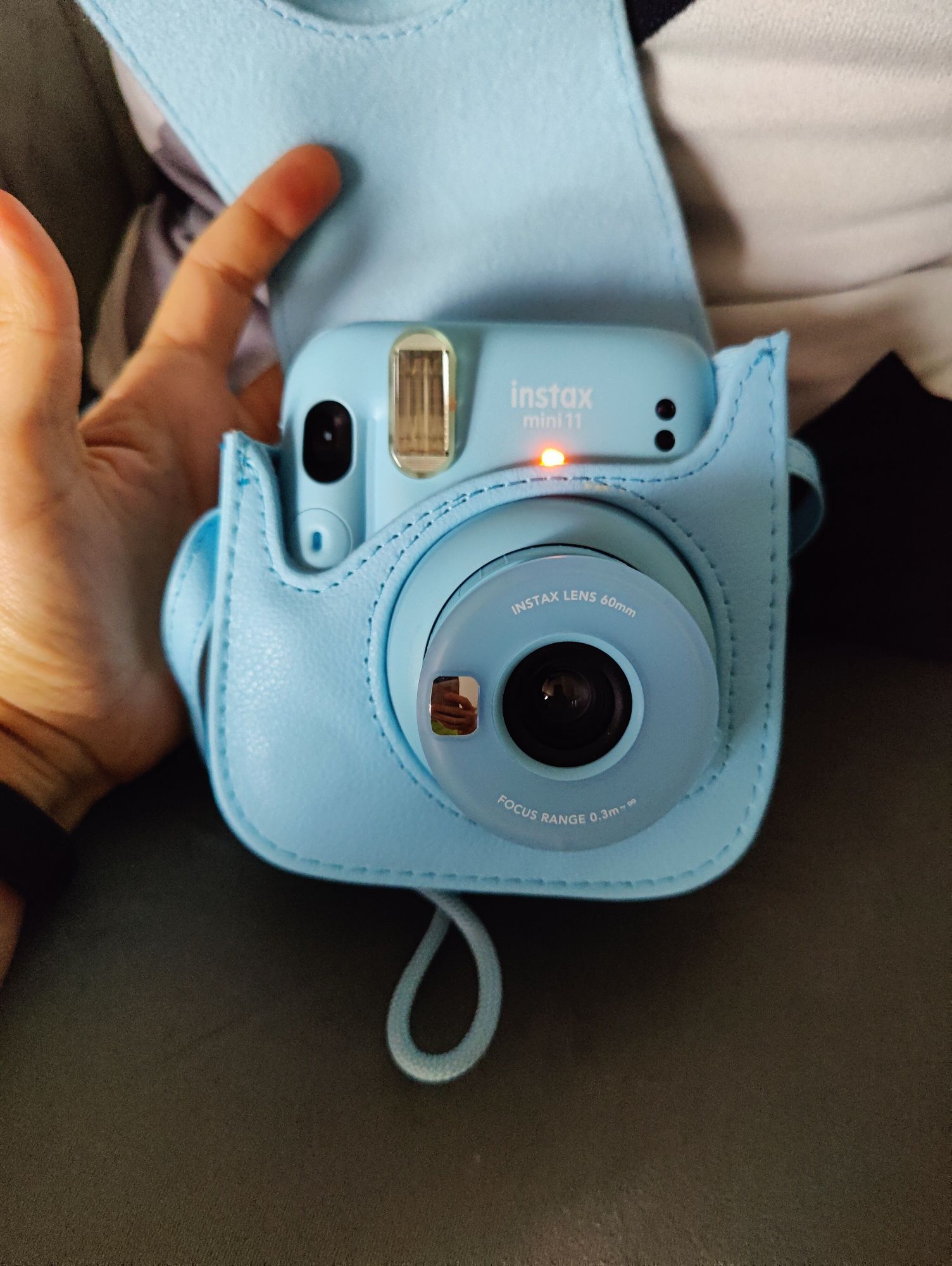 Máquina fotográfica instax