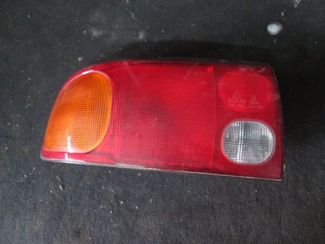 Farol Tras 043 1563L MITSUBISHI LANCER 1996 ESQ