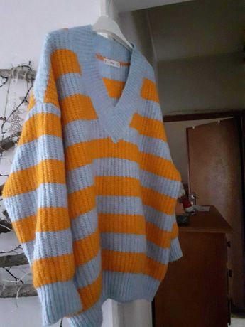 Camisolão em lã, laranja e cinzento, da Mango