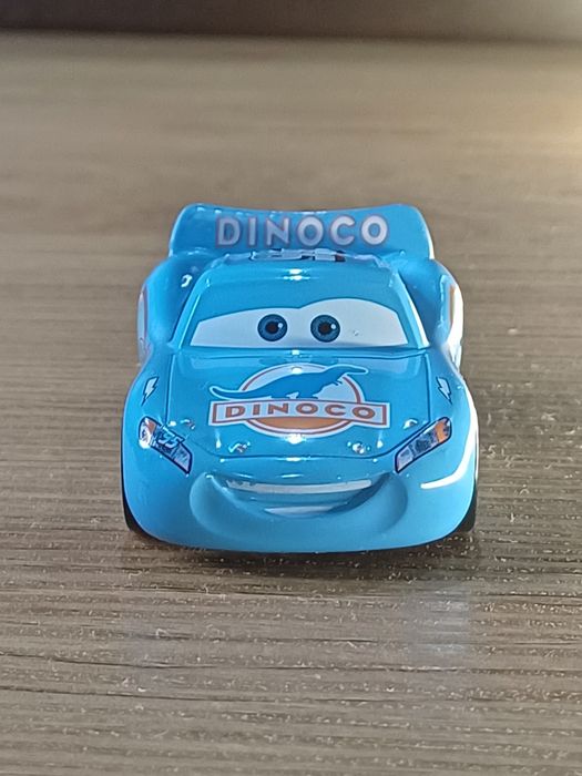 Auta Cars Zygzak McQueen Dinoco niebieski NOWY metalowy skala 1:55