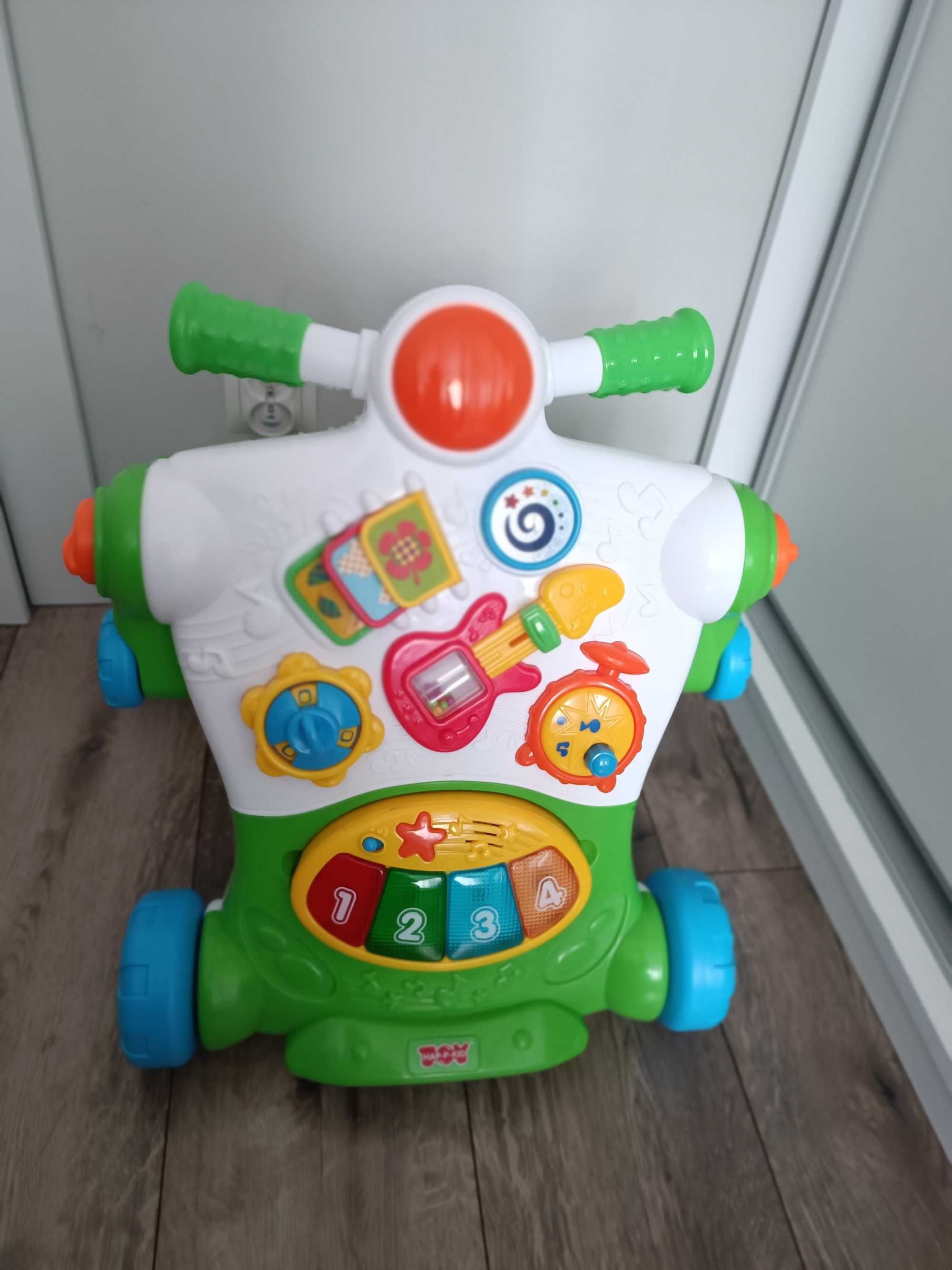 Smiki pchacz/jeździk muzyczny dla dziecka